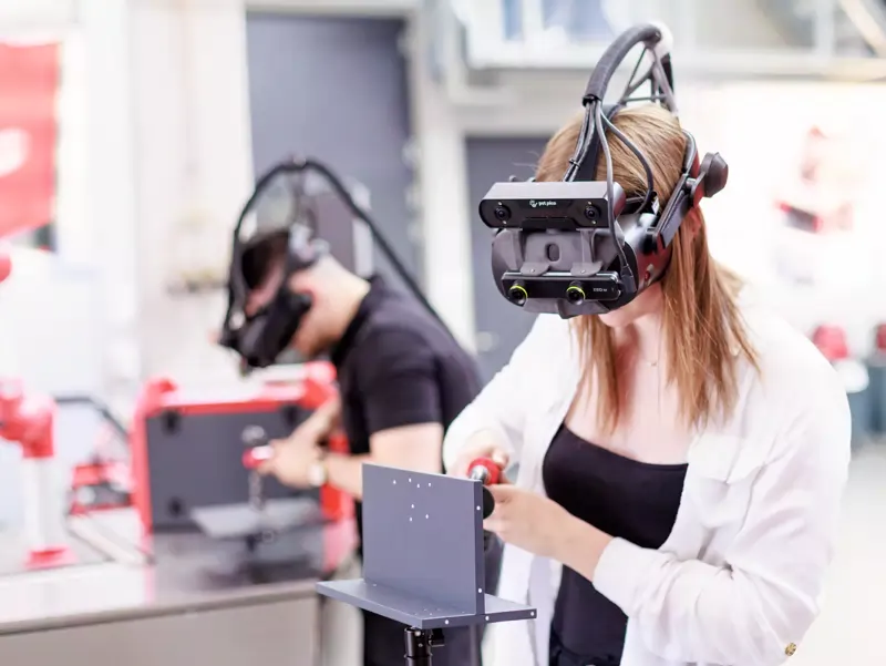 Woman trains welding at the Welducation Simulator