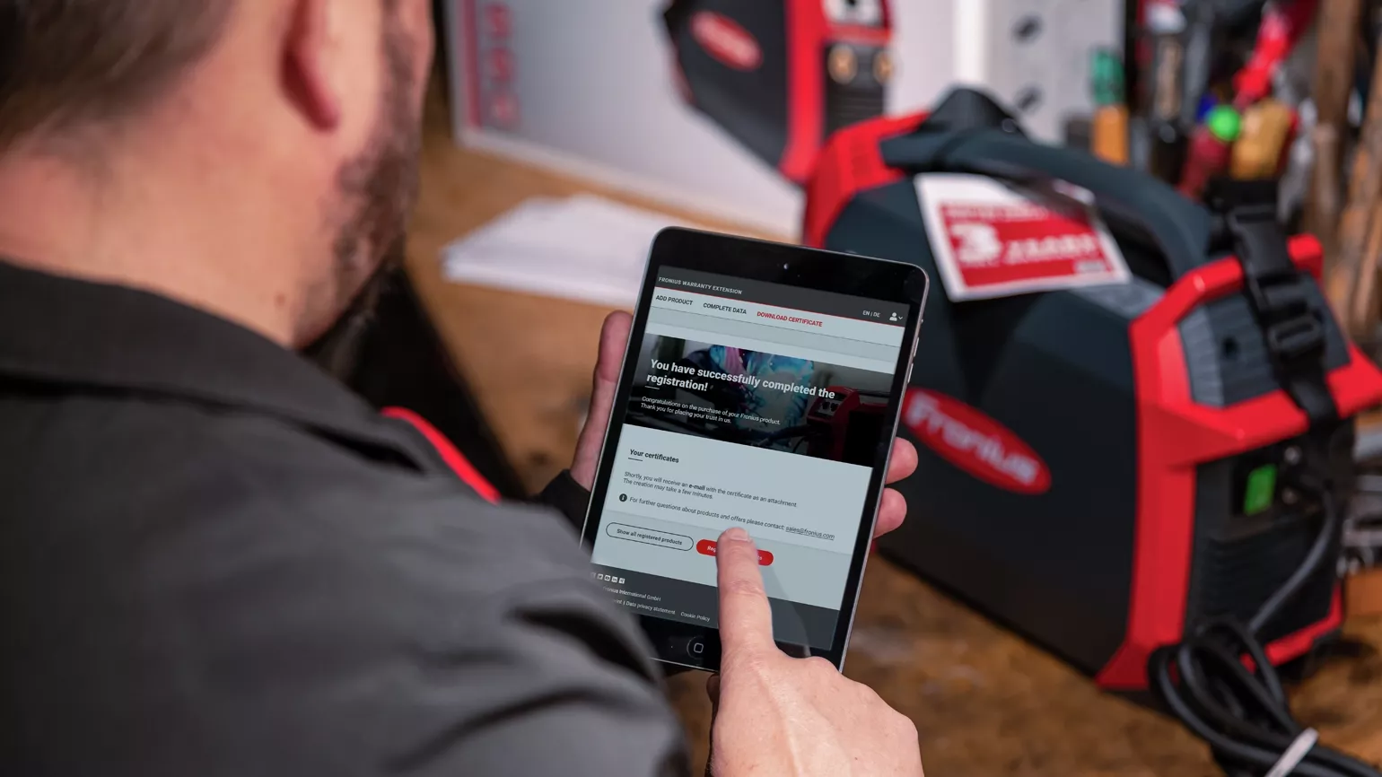 Man checking the warranty page on his mobile device