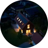 House in darkness with lights on