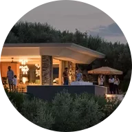 Illuminated house at sunset