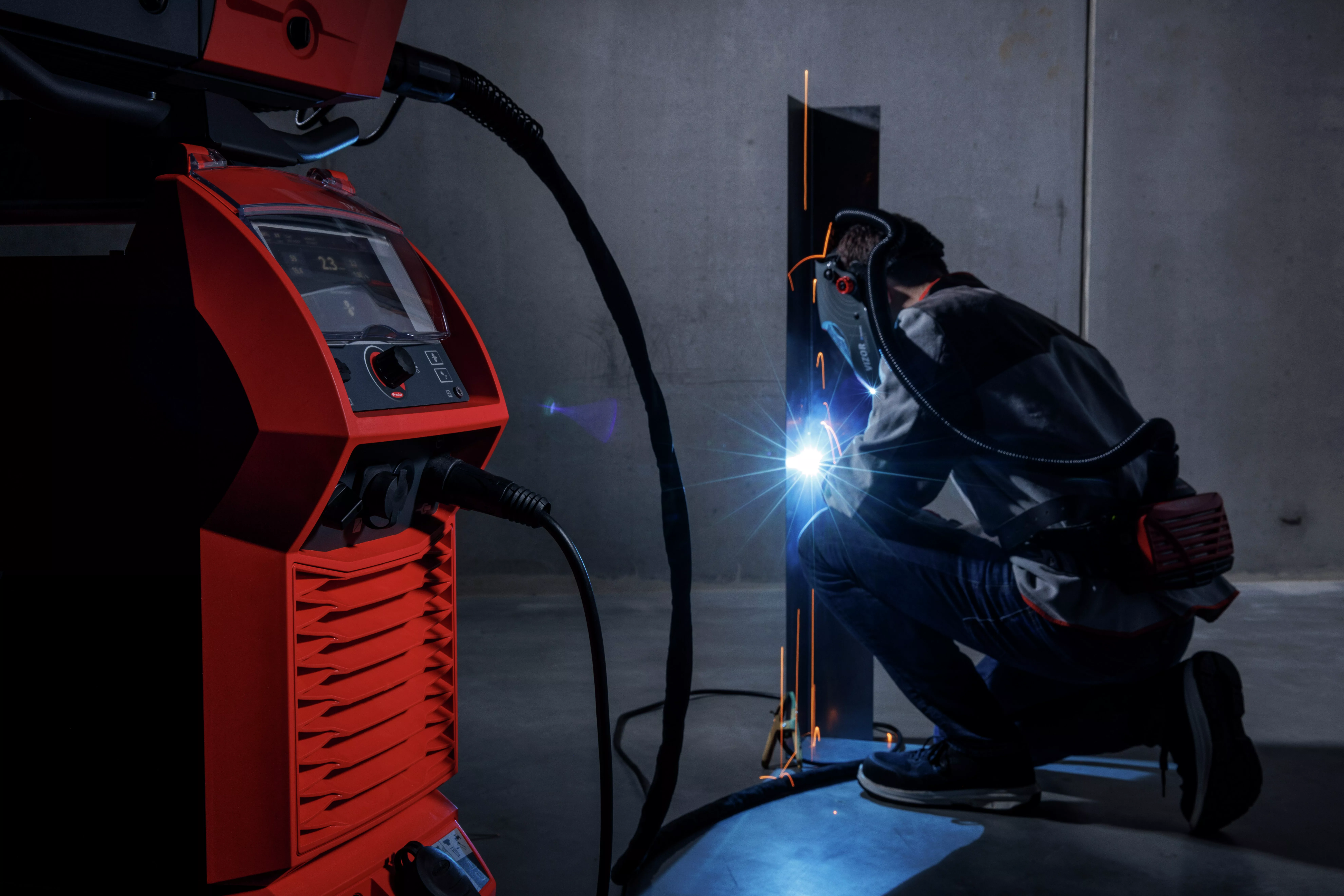 Man welding with Fronius TPSi