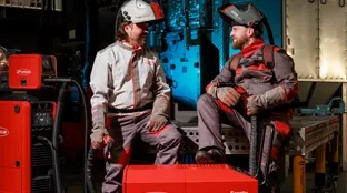 Two welders with welding machines