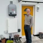 Owner, Chris Parsons, outside one of the homes at Howgate Close